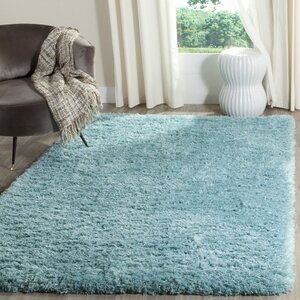 Hermina Light Turquoise Area Rug