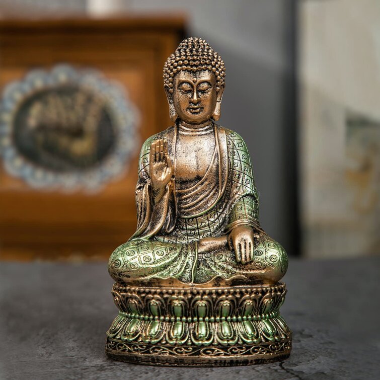 Urban Trends Resin Buddha Figurine with Pointed Ushnisha in Bhumisparsha Mudra on Lotus Base and Painted Finish Gold