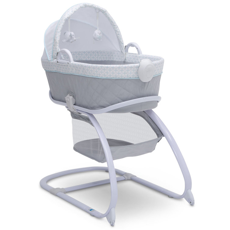 delta bassinet green and white