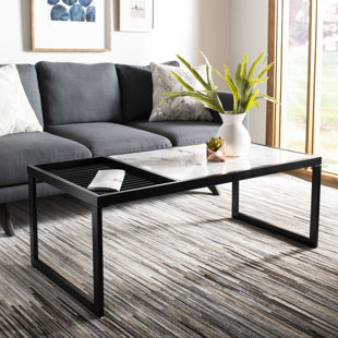 Petitt Coffee Table by Orren Ellis