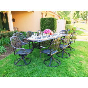 Go to store & view more images Nina Rectangular 9 Piece Dining Set with Cushions by Fleur De Lis Living