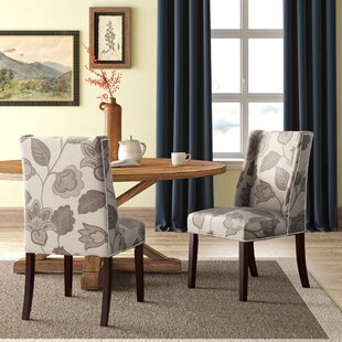 Wingback Dining Room Chair - The Essential Guide To The Wingback Chair One Kings Lane / Large scale, small scale pattern and texture on the floor (brick and animal hide) and studs on chair.