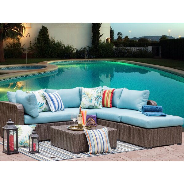 Outdoor 4 Piece Wicker Sectional Seating Group with Cushions