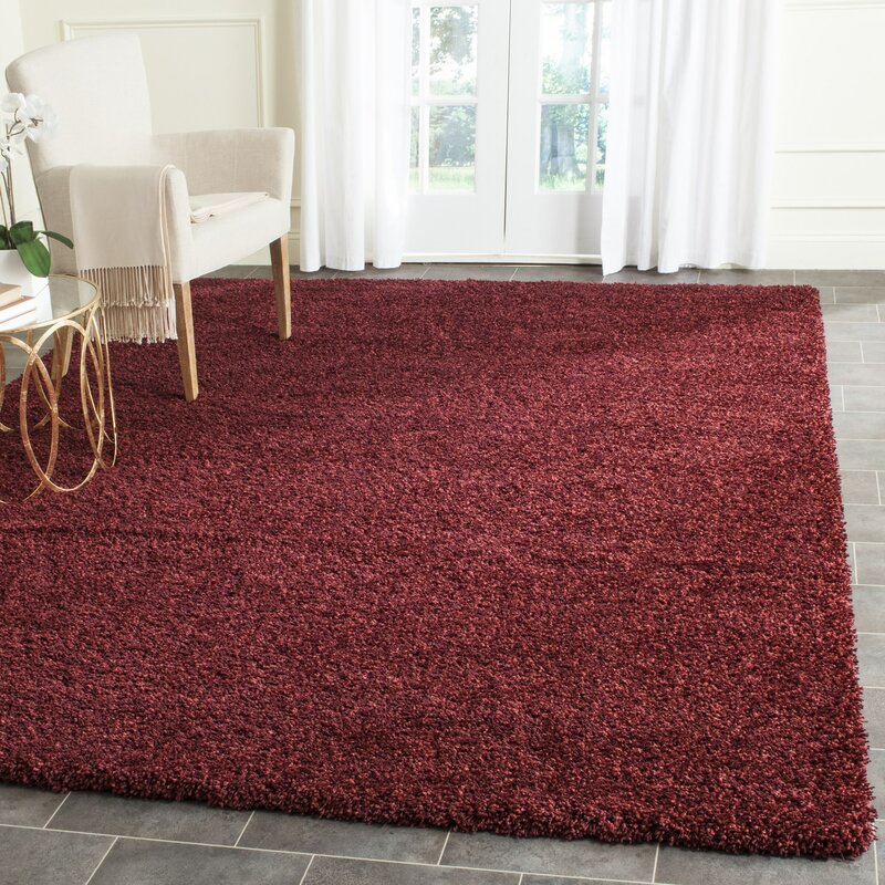 maroon area rug