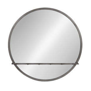 round metal framed mirror