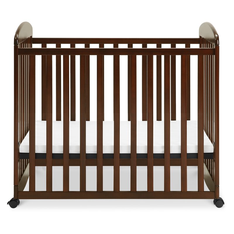 davinci alpha mini rocking crib in white