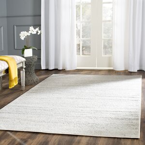 Busick Ivory/Silver Area Rug