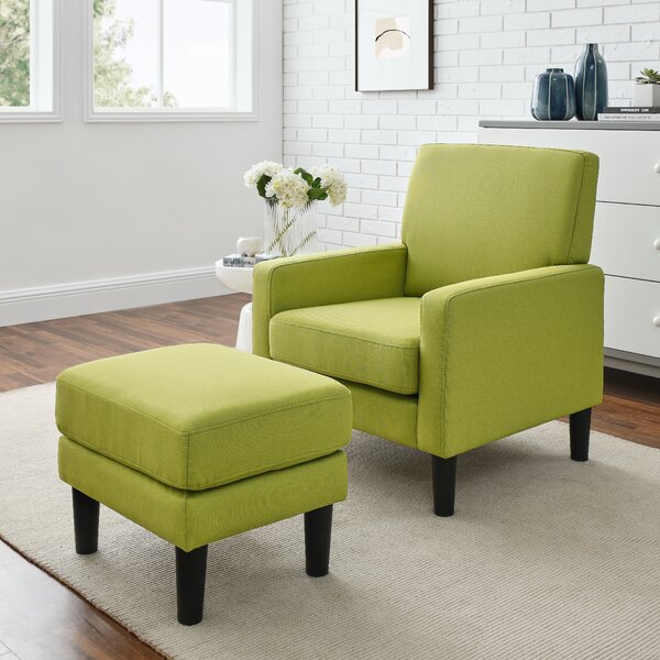 green chair and foot stool