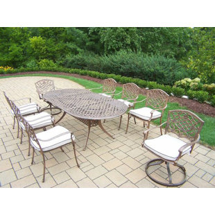 Go to store & view more images Mississippi 9 Piece Dining Set with Cushions by Oakland Living