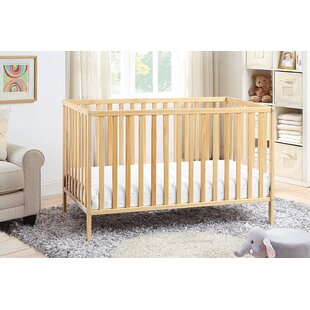 light wooden crib