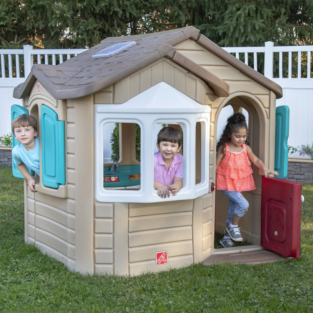 naturally playful front porch playhouse
