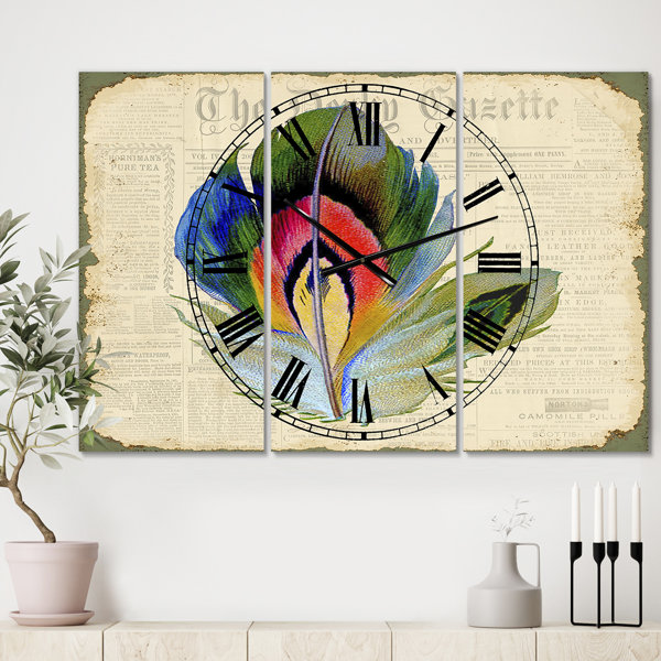 East Urban Home Oversized Elegant Feather On Newspaper Ii 3 Panels Wall Clock Wayfair