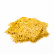 yellow furry pillow
