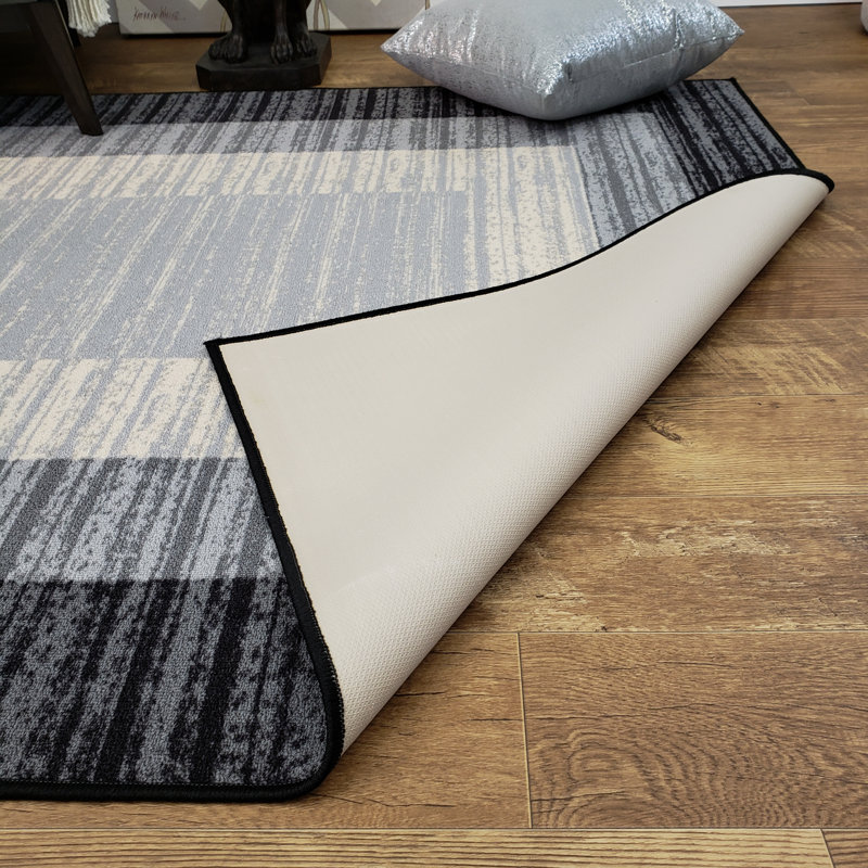 Ebern Designs Zlatkus Striped Rubber Backed Black Gray Area Rug Rubber Backed Black Gray Area Rug