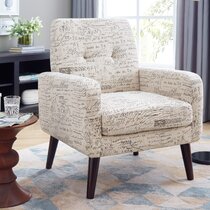 beige upholstered armchair