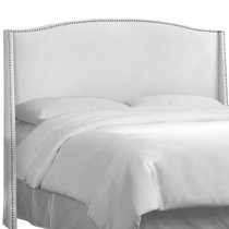 white cushioned headboard