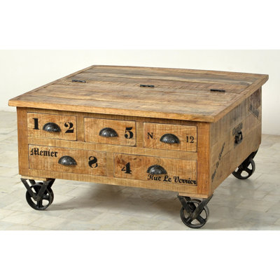 Kym Solid Wood Wheel Coffee Table with Storage