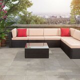 https://secure.img1-fg.wfcdn.com/im/22491264/resize-h160-w160%5Ecompr-r85/7458/74580928/Bump+Outdoor+7+Piece+Sectional+Seating+Group+with+Cushions.jpg