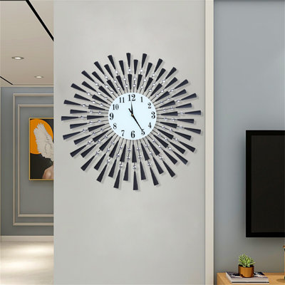 Pyari  27.55'' Metal Home Decorative Wall Clock