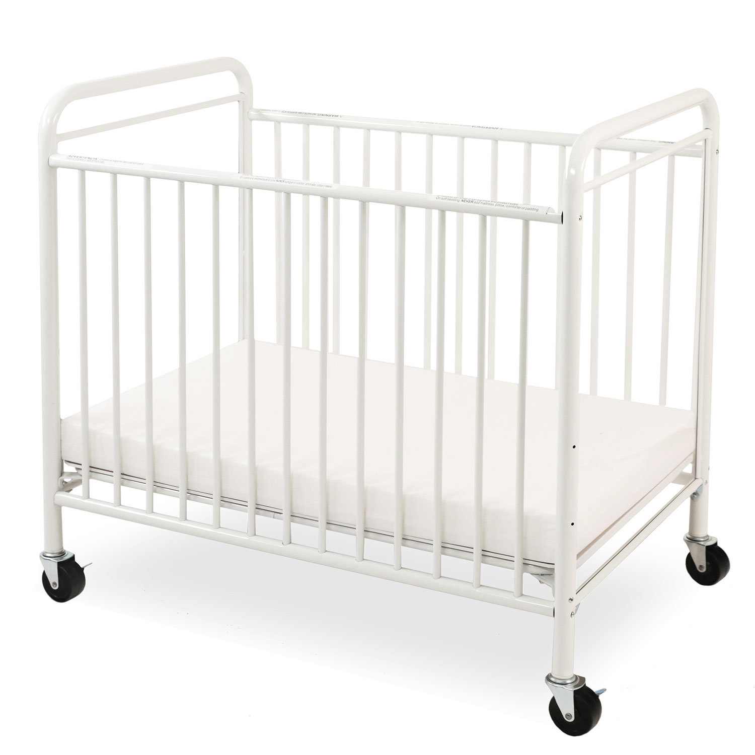 white portable crib