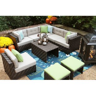 View Kiana 7 Piece Rattan Sunbrella Sectional Seating Group with Sunbrella