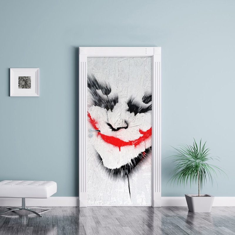 painted joker face on particle board door sticker