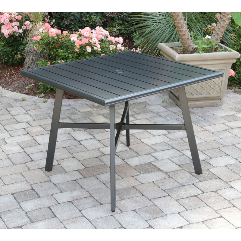 Charlton Home Bearden 5 Piece Commercial Grade All Weather Patio Set With 4 Woven Dining Chairs And A 38 In Aluminum Slat Top Dining Table Wayfair