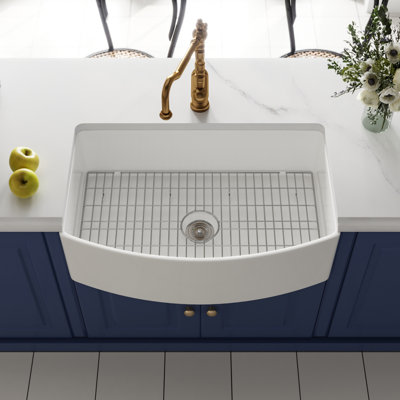 DeerValley Fireclay Single Basin Curved Farmhouse Kitchen Sink with Sink Grid and Basket Strainer