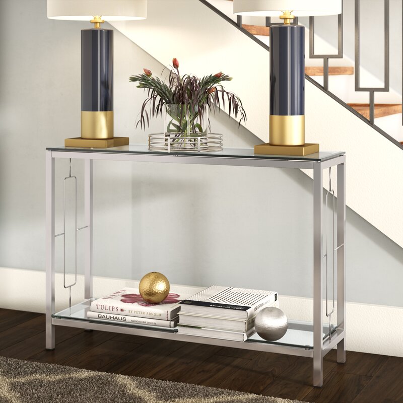 narrow console table behind couch