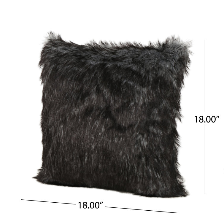 black furry throw pillows
