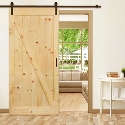 Kiby Paneled Wood Unfinished Knotty Barn Door Without Installation