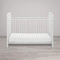 white crib with wheels