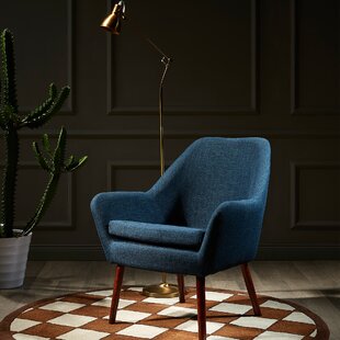 small teal armchair