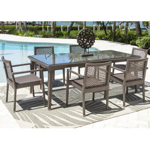 Go to store & view more images Maldives 7 Piece Dining Set with Sunbrella Cushions (Set of 7) by Panama Jack Outdoor