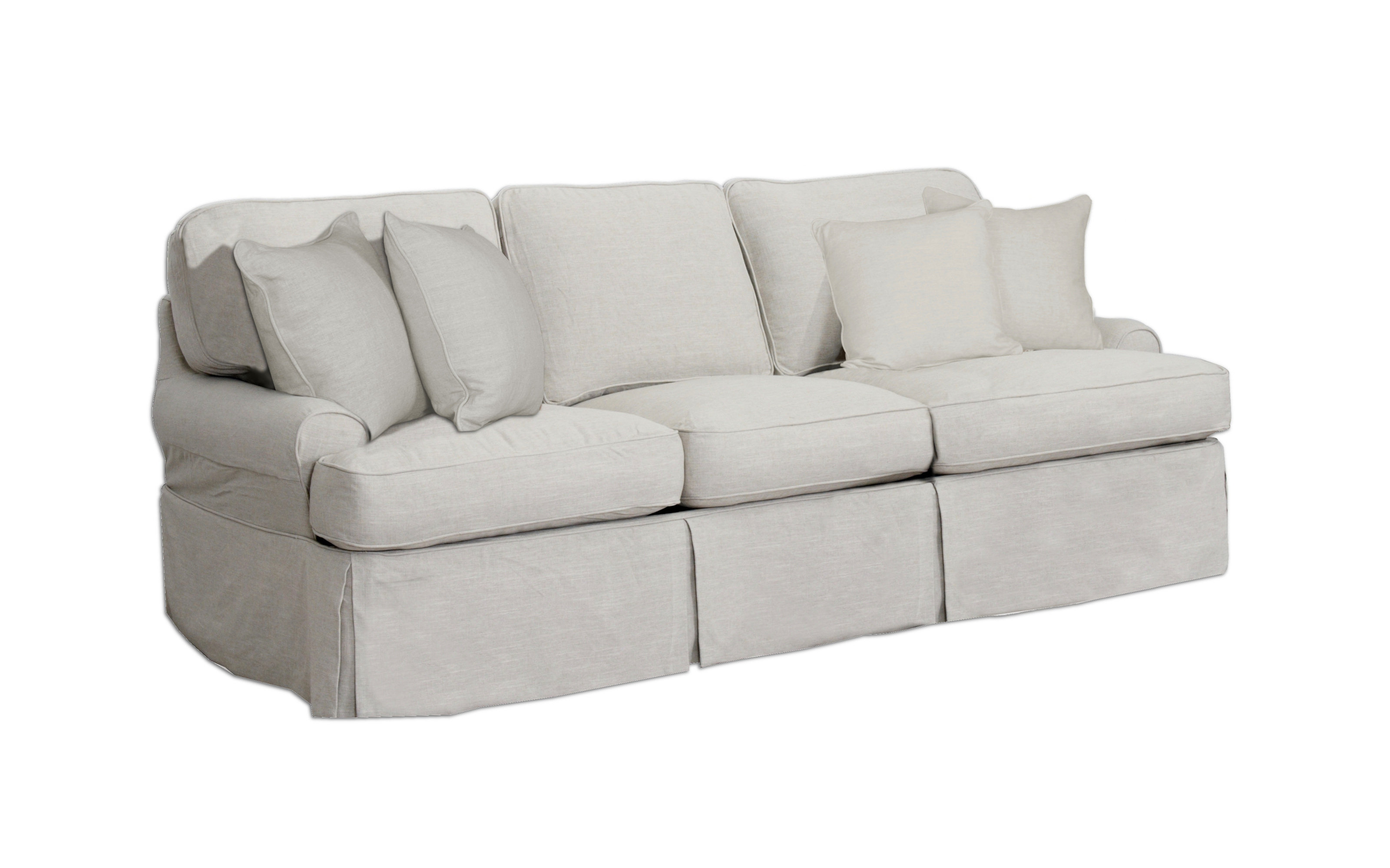 white linen slipcovered sofa