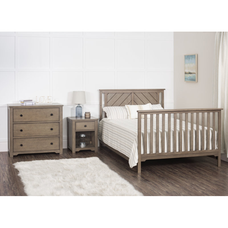 mismatched crib and dresser