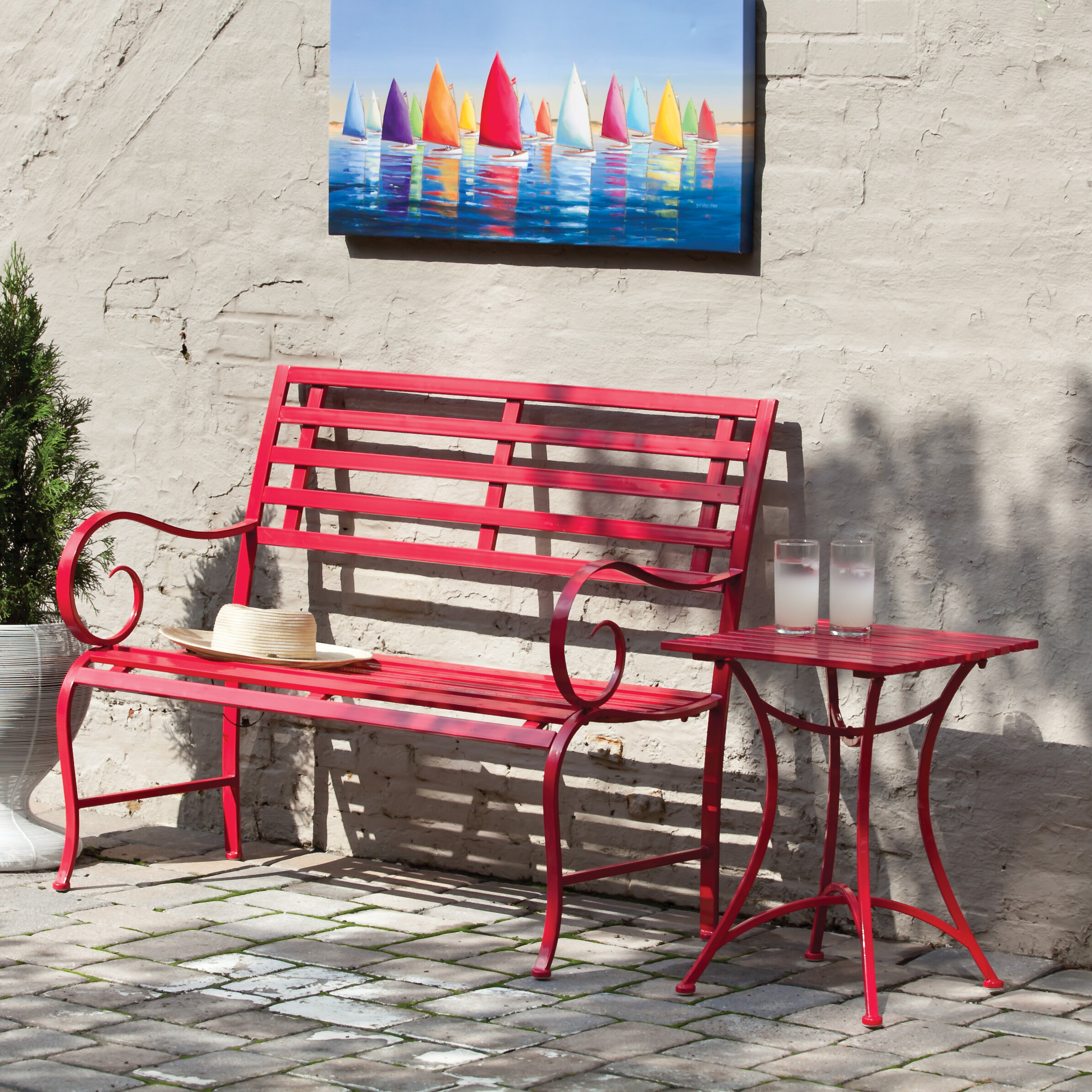 red outdoor metal bench