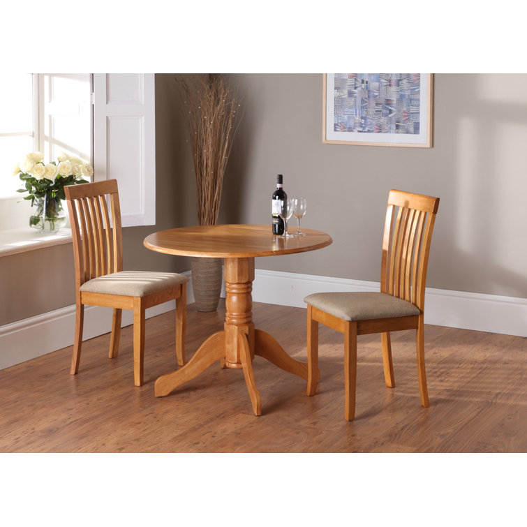 Round dining table with fold down sides clearance