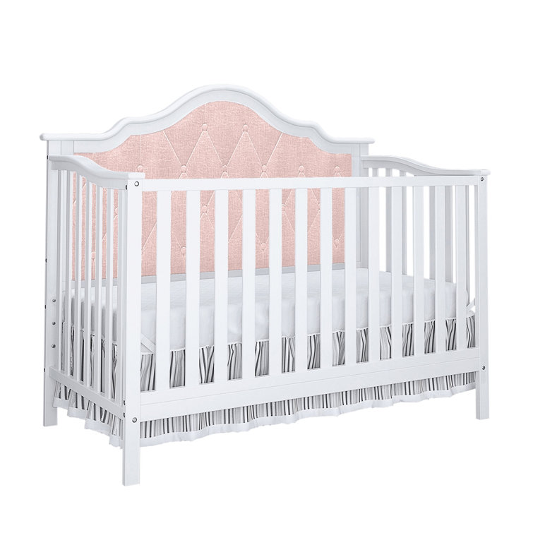 pink tufted crib