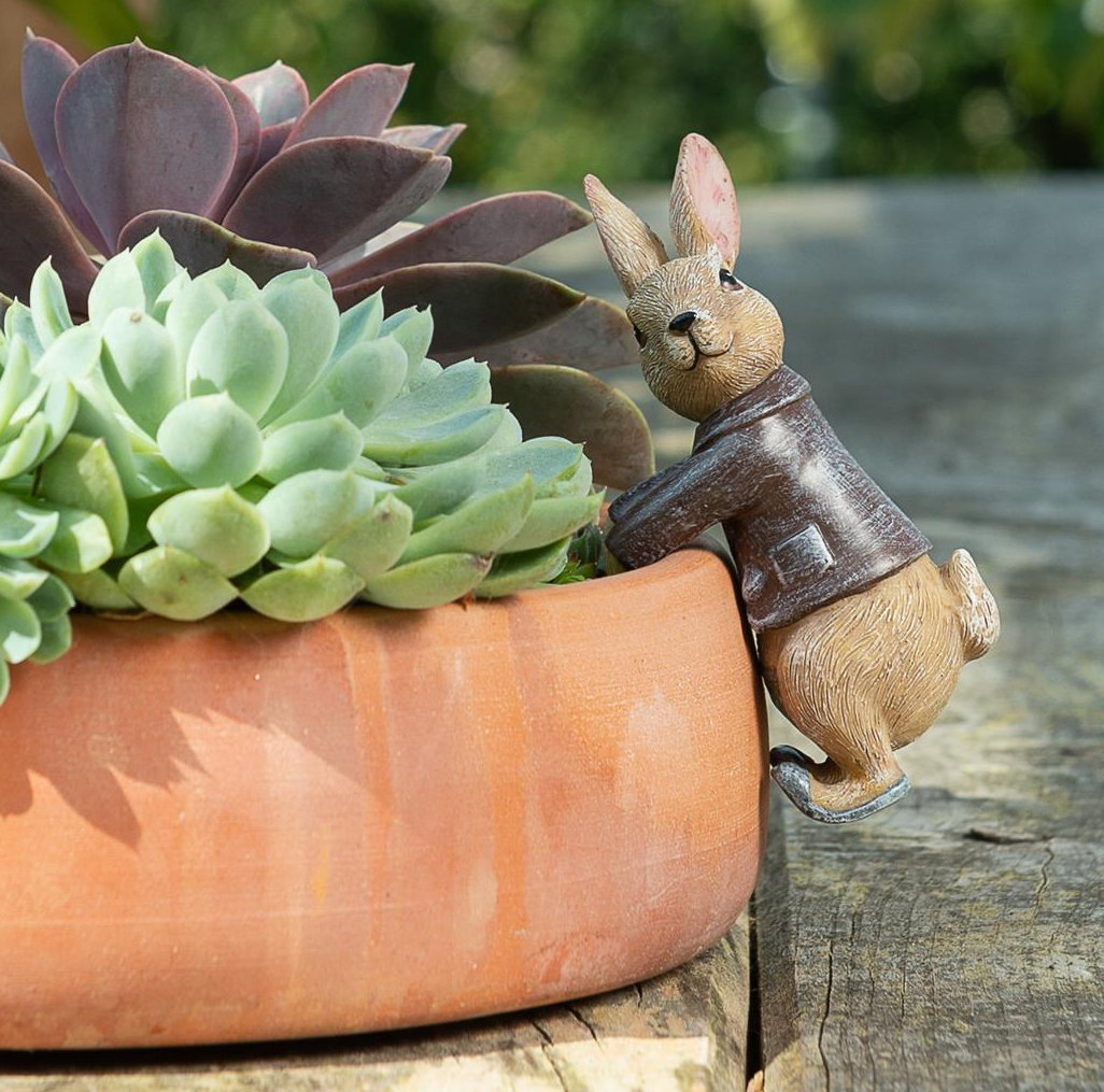 Happy Larry Blumentopffigur Isam