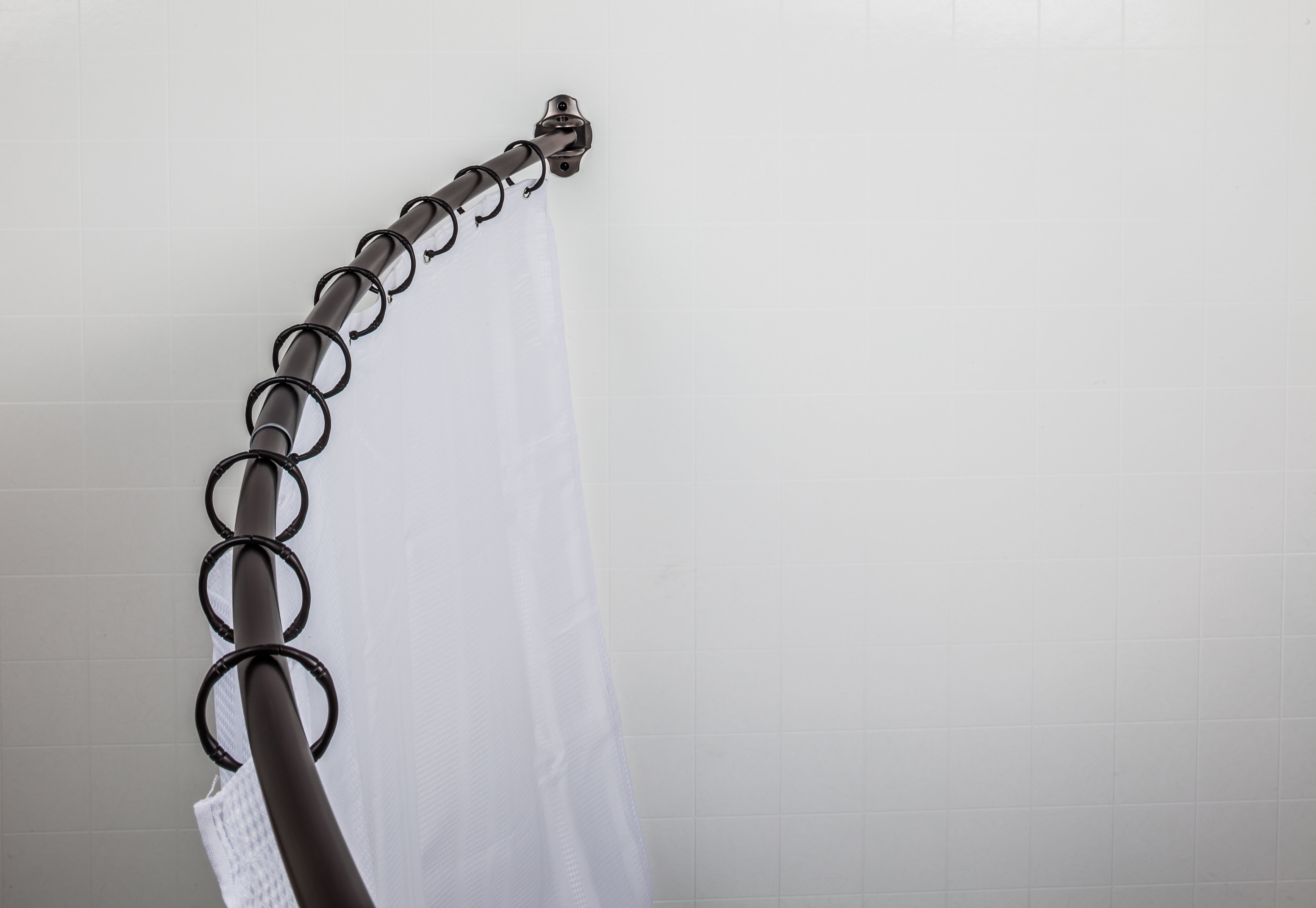 extends from 28" to 48" wide CURVED CURTAIN ROD #684 