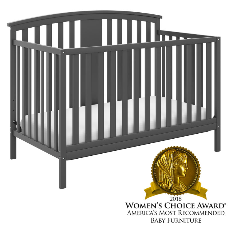 The crib is a basic square shape, with a taller back and lowered front. true yoga evergreen