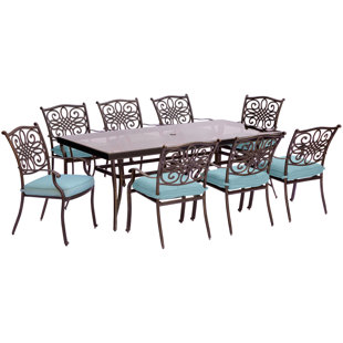 Go to store & view more images Carleton 9 Piece Modern Dining Set with Cushions by Fleur De Lis Living