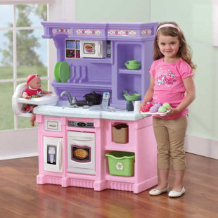 little girl play kitchen set