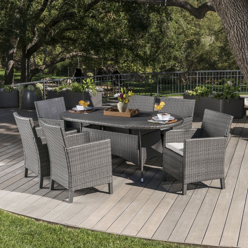 Argueta Outdoor Wicker 7 Piece Dining Set with Cushions