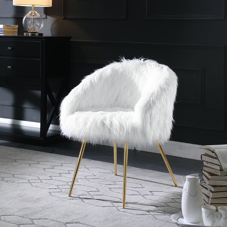 white fuzzy armchair