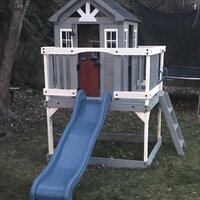 cedar playhouse with kitchen