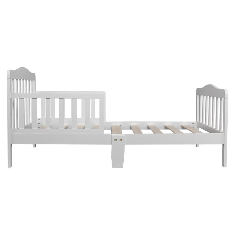 white wooden toddler bed