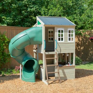 wooden clubhouse with slide