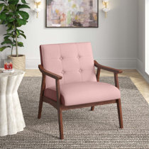 pink tufted armchair